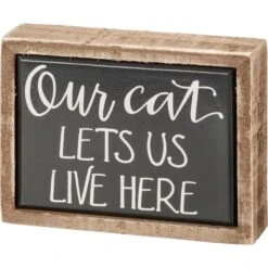 "Our Cat Lets Us Live Here" Box Sign