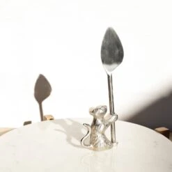 Mouse Holding Cheese Knife